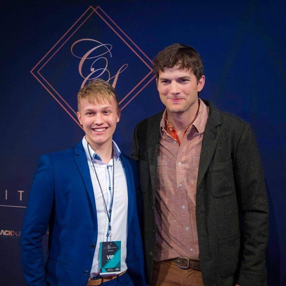 With Ashton Kutcher